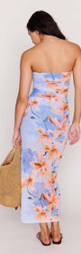 Back view of a model wearing a Blue Floral Strapless Mesh Midi Dress, showcasing colorful floral prints and a stylish design.