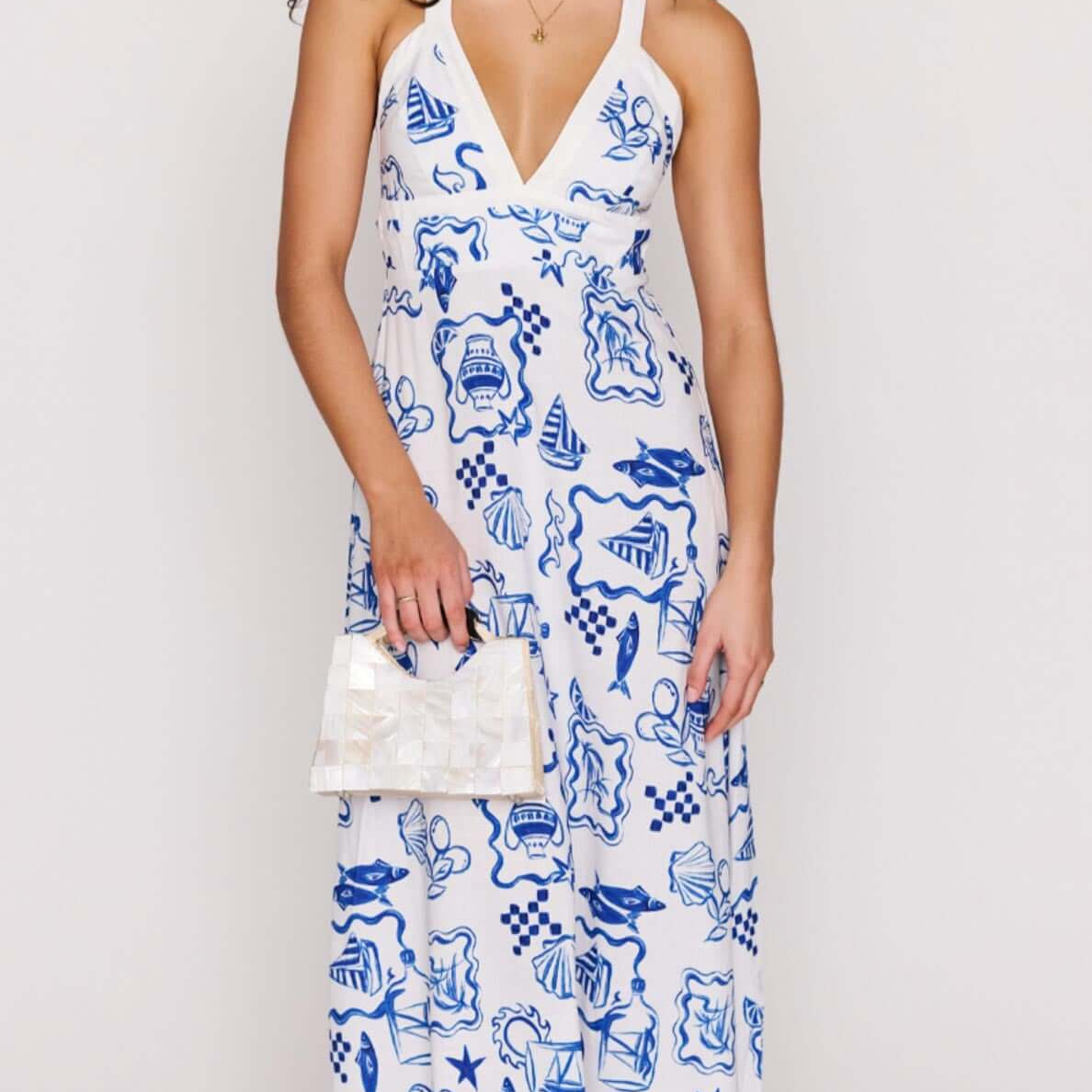 Blue Summer Cotton Blend Halter Neck Midi Dress featuring a printed design and flattering silhouette.