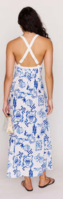 Blue Summer Cotton Blend Halter Neck Midi Dress showing a cross-back design and vibrant blue-and-white print from the back.