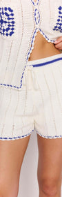 Blue & White Cotton Crochet Knit Shorts featuring a relaxed fit and elastic waistband with drawstring for summer comfort.
