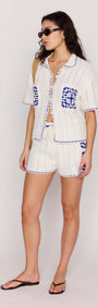 Model showcasing Blue & White Cotton Crochet Knit Shorts paired with a matching shirt, perfect for summer outings.