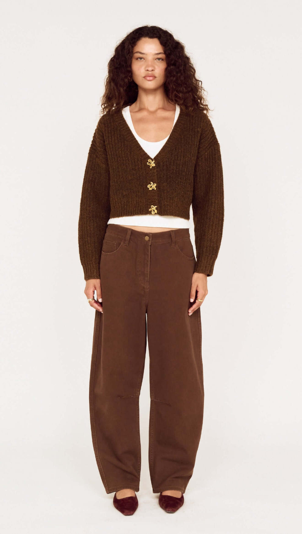 Brown Cropped Cardigan with Gold Button Detail styled with wide-leg pants, perfect for casual layering and everyday wear.