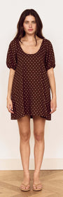 Brown Linen Blend Polka Dot Puff Sleeve Mini Dress on a model, featuring puff sleeves and a polka dot print.
