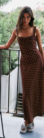 Brown Linen Blend Polka Dot Square Neck Midi Dress worn by a model, showcasing its elegant fit and polka dot design.