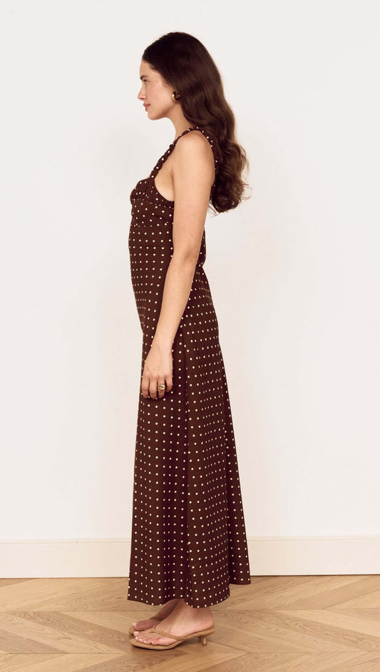 Brown Linen Blend Polka Dot Square Neck Midi Dress worn by a model showcasing its flattering silhouette and design.