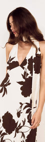 Brown and Cream Floral Halter Neck Maxi Dress featuring a plunging neckline and oversized floral print.
