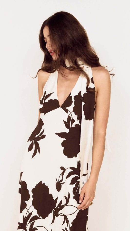 Brown and Cream Floral Halter Neck Maxi Dress featuring a plunging neckline and oversized floral print.