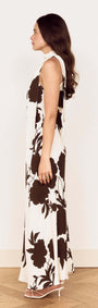 Brown and Cream Floral Halter Neck Maxi Dress showcasing a side view with oversized floral print and elegant design.