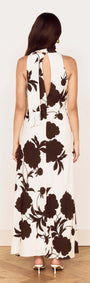 Back view of the Brown and Cream Floral Halter Neck Maxi Dress showcasing its stylish design.