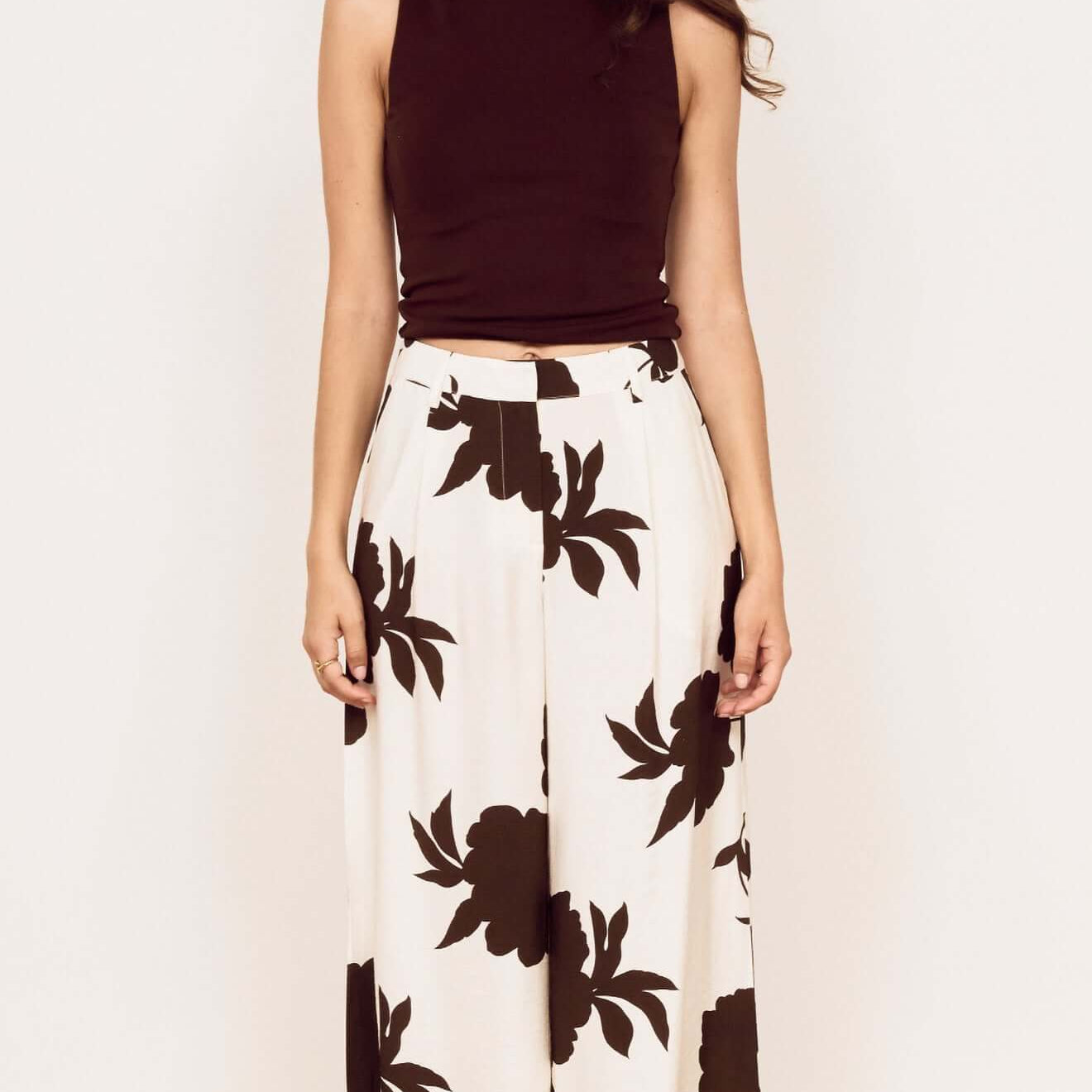 Model wearing Brown and Cream Floral Wide Leg Pant paired with a matching top, showcasing an elegant and relaxed style.