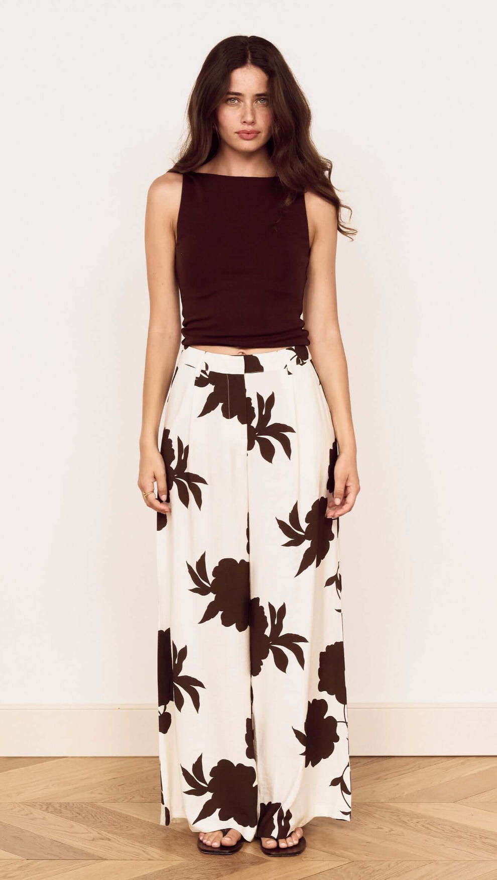 Model wearing Brown and Cream Floral Wide Leg Pant paired with a matching top, showcasing an elegant and relaxed style.