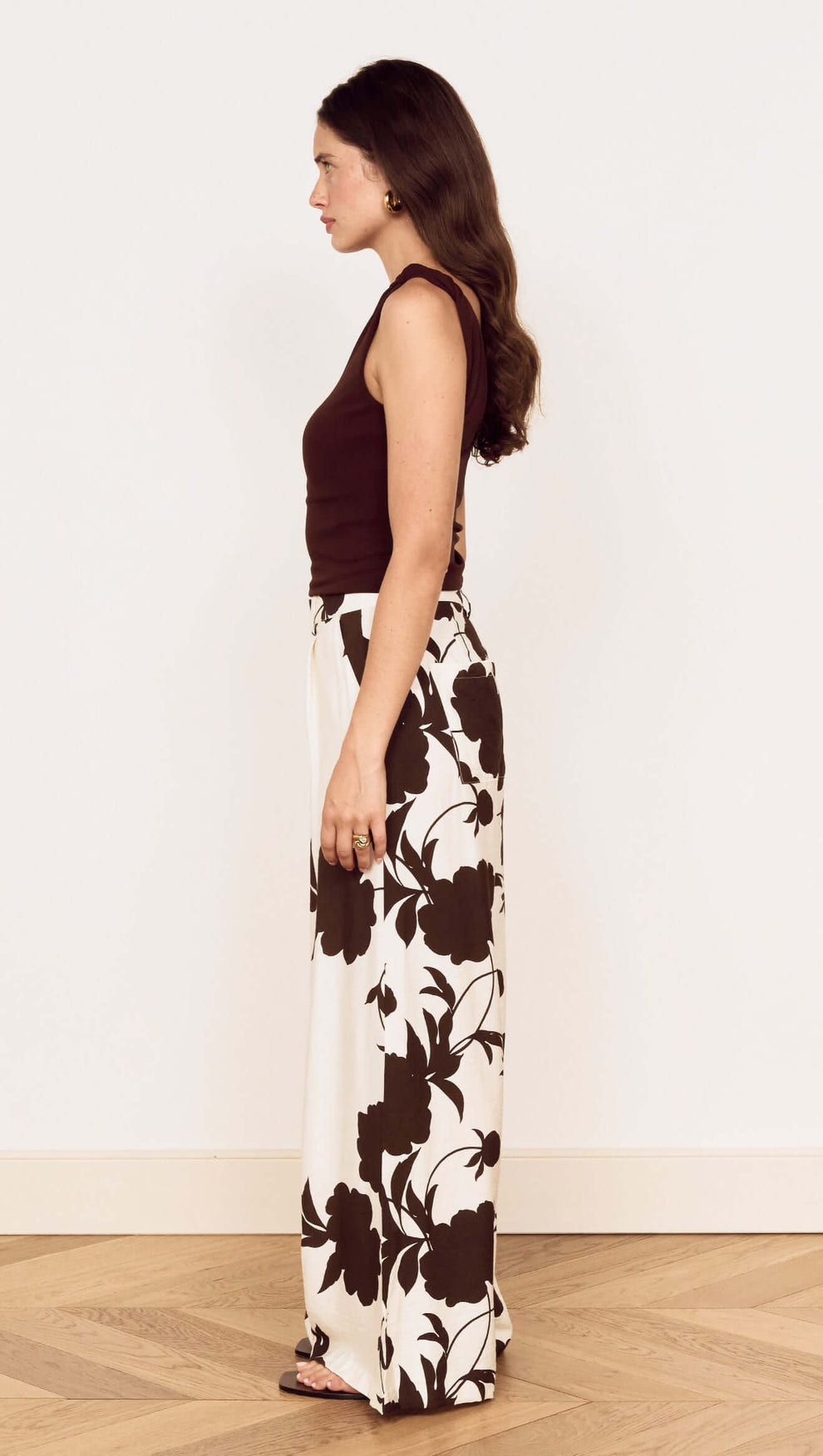 Model showcasing the Brown and Cream Floral Wide Leg Pant in a side profile view.