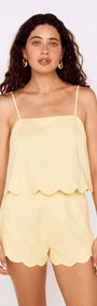 Butter Yellow Cotton Blend Scallop Hem Shorts worn with matching scalloped top on a model.