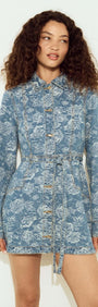 Button Through Floral Denim Dress with Tie Waist worn by model, featuring a floral print and button closure.