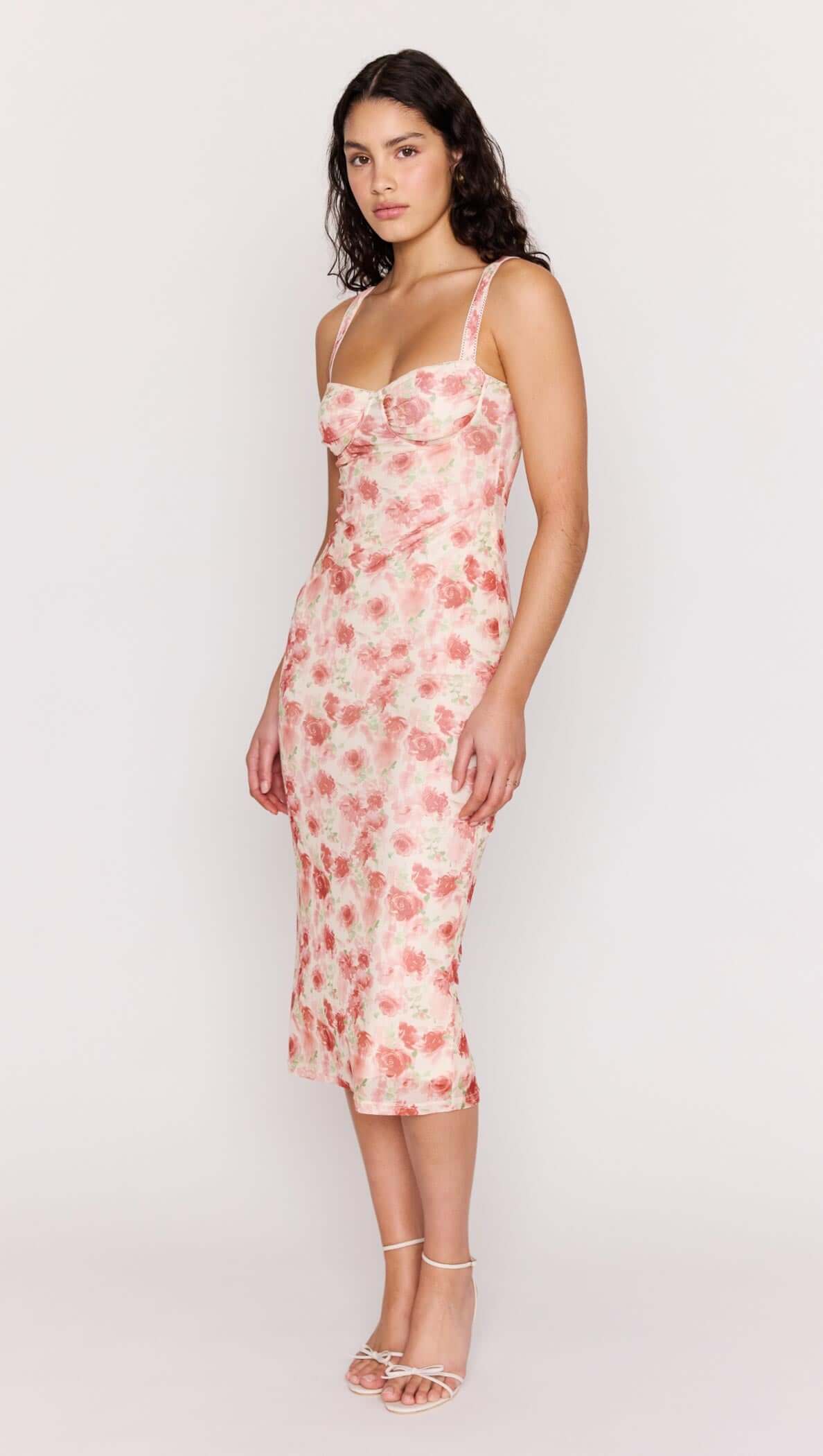 Pink Floral Bustier Mesh Midi Dress showcased on a model, featuring a floral design and structured bustier neckline.