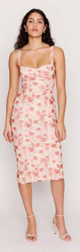 Model wearing a Pink Floral Bustier Mesh Midi Dress, showcasing its fitted design and floral pattern.