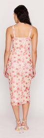 Back view of a woman wearing the Pink Floral Bustier Mesh Midi Dress with floral print.