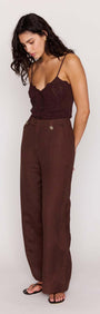 A model wearing Chocolate Brown Linen Blend Wide-Leg Pants paired with a dark top, showcasing a stylish warm-weather outfit.