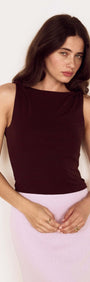 Model wearing the Chocolate Twist Shoulder Mesh Top with a fitted silhouette and twist shoulder detailing.
