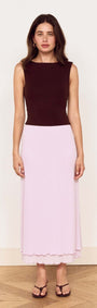 Chocolate Twist Shoulder Mesh Top model wearing a fitted silhouette with twist detailing, boat neckline, and low scoop back.