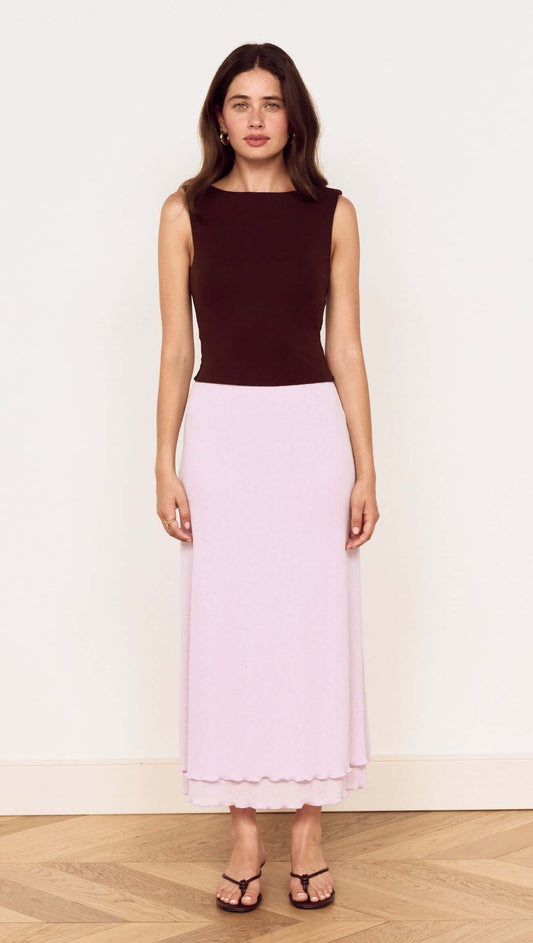 Chocolate Twist Shoulder Mesh Top model wearing a fitted silhouette with twist detailing, boat neckline, and low scoop back.