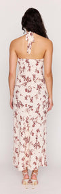 Back view of the Cream Floral Toile Halter Maxi Dress featuring a delicate floral print and adjustable halter tie.