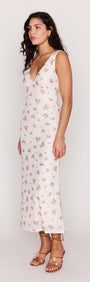 Cream Floral V-Neck Mesh Midi Dress displayed on a model, showcasing its flattering silhouette and floral design.