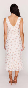Cream Floral V-Neck Mesh Midi Dress worn from the back, showcasing floral patterns and a flattering V-neckline.