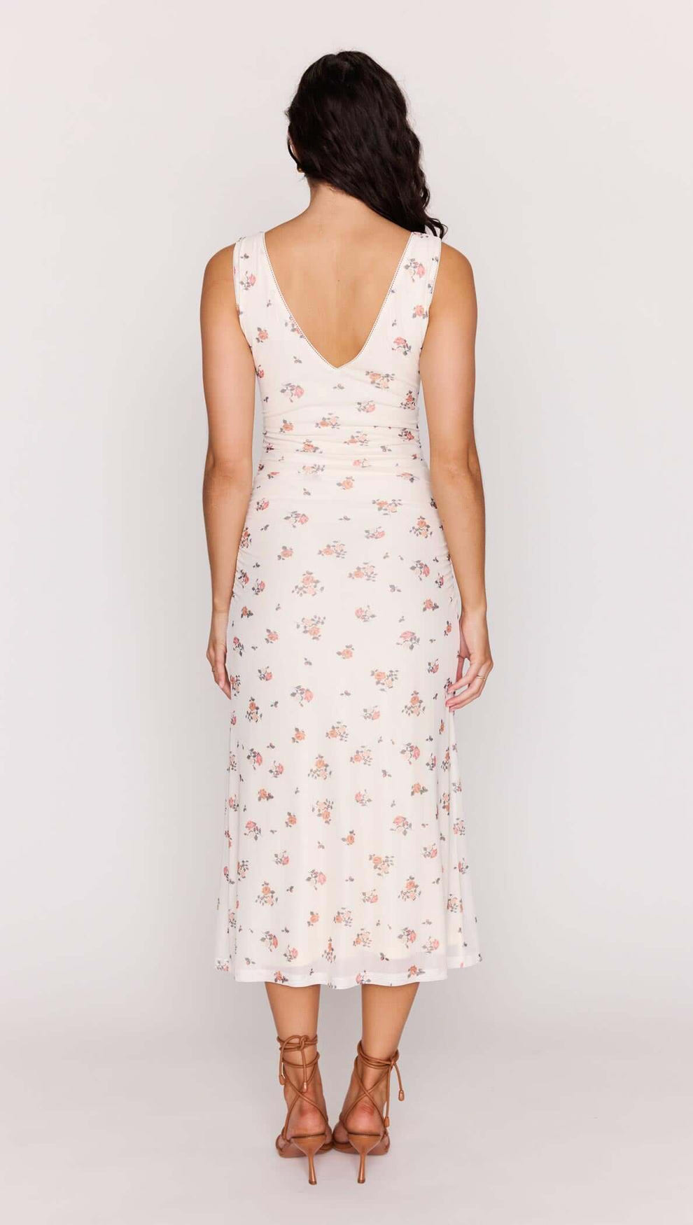 Cream Floral V-Neck Mesh Midi Dress worn from the back, showcasing floral patterns and a flattering V-neckline.