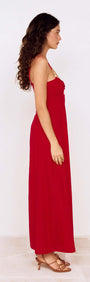 Model wearing a Deep Red Twist Front Maxi Dress in profile view, showcasing the elegant design and flowy silhouette.