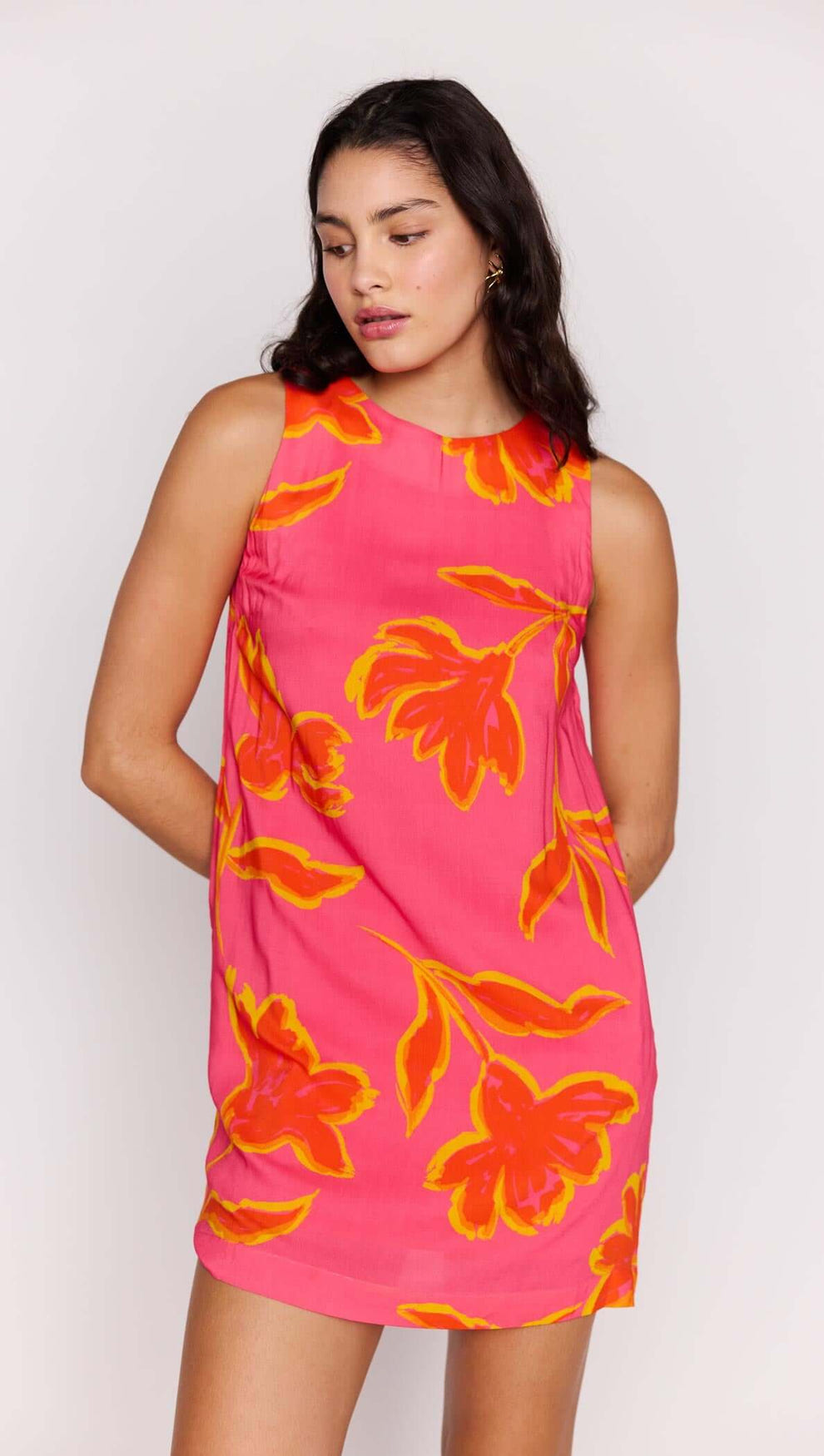ELODIE SHIFT MINI DRESS featuring vibrant floral patterns in pink and orange shades.