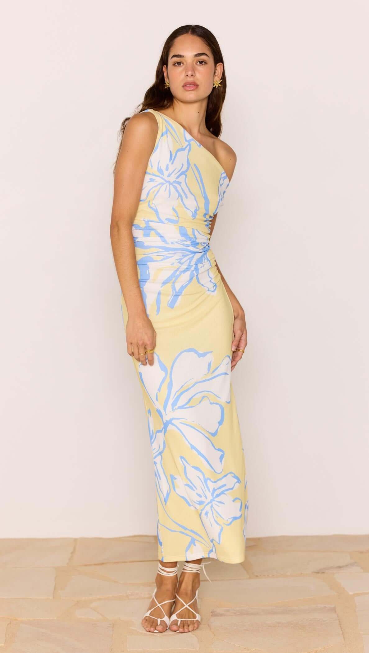 Yellow & Blue Floral Asymmetric Mesh Maxi Dress on model featuring floral print and one-shoulder design.