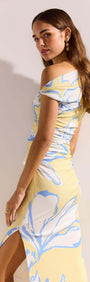 Yellow & Blue Floral Asymmetric Mesh Maxi Dress worn by model featuring asymmetrical neckline and flattering side gathering.
