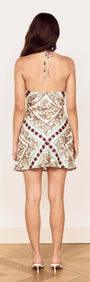 Back view of the Floral Scarf Print Halter Mini Dress showcasing its unique print and adjustable halter tie.