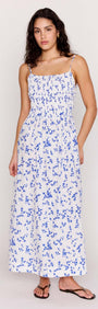 Blue Floral Cotton Backless Midi Dress featuring a soft ditzy floral print and lightweight cotton poplin fabric.