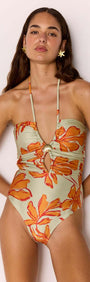 Green & Orange Floral Cut Out Swimsuit with Shell Embellishment worn by model, showcasing bold floral patterns.