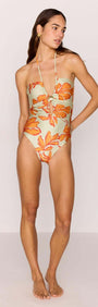 Green & Orange Floral Cut Out Swimsuit with Shell Embellishment worn by model, showcasing a stylish keyhole design.