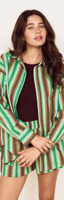 Model wearing the Green Stripe Cotton Oversized Shirt styled with matching shorts for a chic look.