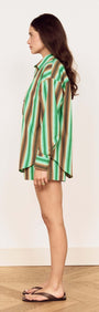 Model showcasing the Green Stripe Cotton Oversized Shirt in a stylish side profile view.