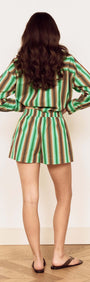 Model wearing Green Stripe Cotton Relaxed Short, showcasing the vibrant stripe pattern and relaxed silhouette.