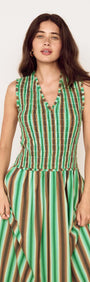 Model wearing the Green Stripe Cotton Shirred Midi Dress, showcasing its vibrant green and earthy stripes.