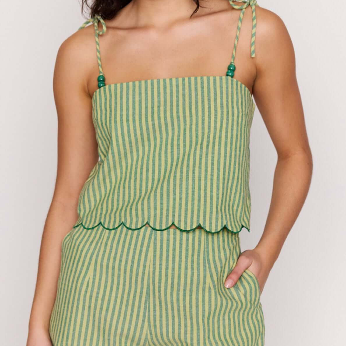 Green Striped Linen Blend Scallop Cami Top with adjustable tie straps and scalloped edging.