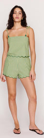 Model wearing Green Striped Linen Blend Scallop Cami Top with scalloped shorts and tie straps.