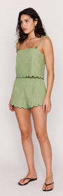 Green Striped Linen Blend Scallop Cami Top on a model with a playful short design, perfect for warm weather.