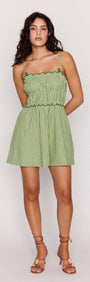 Green Striped Linen Blend Scallop Mini Dress featuring a shirred bodice and flared skirt, ideal for sunny days.