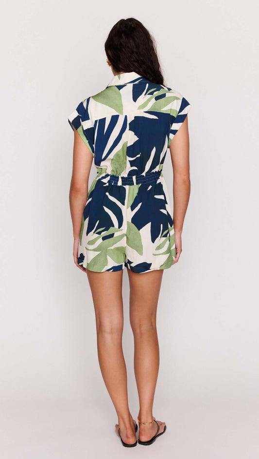 Back view of the Leaf Print ECOVERO Playsuit showcasing its relaxed silhouette and bold botanical design.