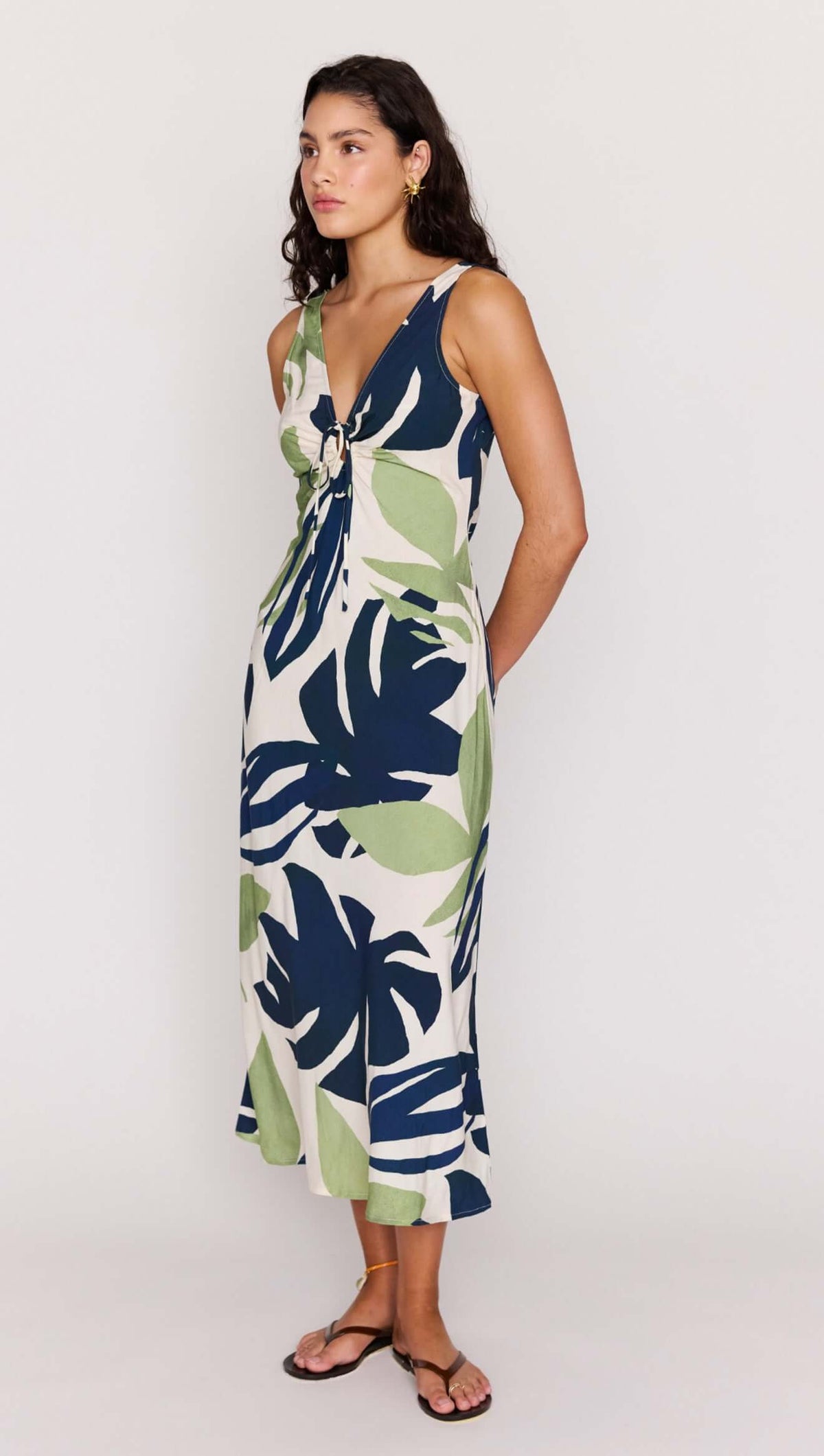 Leaf Print ECOVERO Tie Front Midi Dress featuring a tie-front detail and botanical print, perfect for warm days.