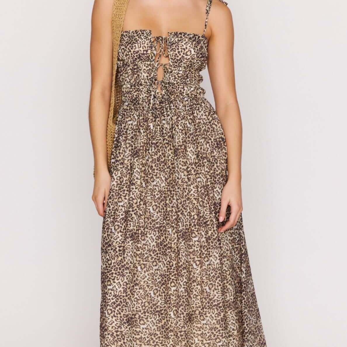 Leopard Tie Front Midi Dress featuring a soft leopard print and flattering silhouette perfect for summer.