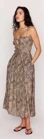 Leopard Tie Front Midi Dress showcasing a flattering silhouette with a ruched bodice and flowing skirt.
