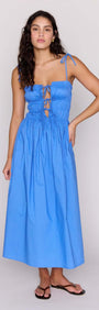 Blue Cotton Tie Detail Midi Dress on a model, showcasing its flattering shirred bodice and adjustable front tie.